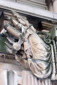 Erosion to stonework on an old building in central Manchester, the detail on this stone carving is gradually being lost. This is the type of damage which is accelerated by elevated levels of pollution.