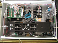 View of the internal components of the SP2, with electronics (top left), flow control (top right) and optical block (bottom) visible.