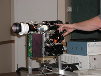 Cloud Particle Imager undergoing calibration with certified size standards.